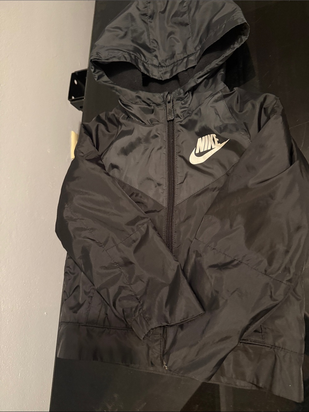 Nike Black Hooded Kids Rain Jacket with White Logo